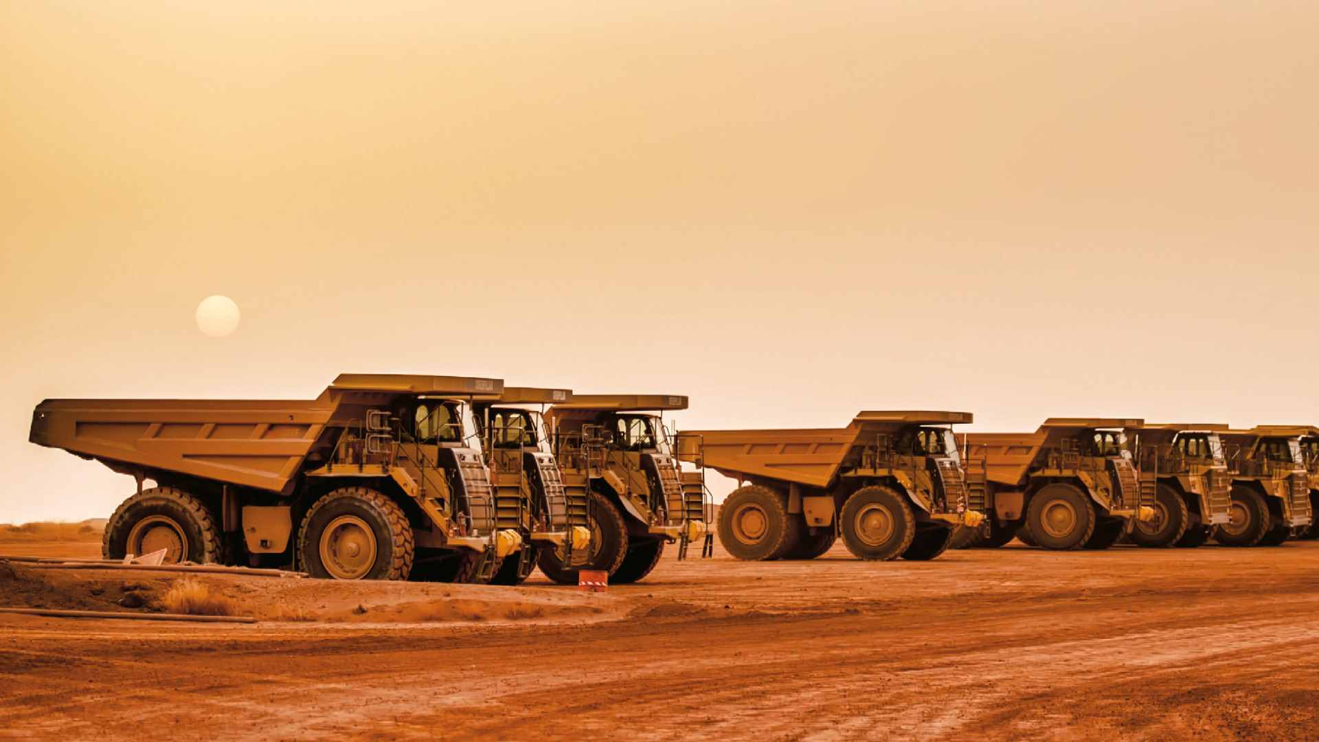 Spannende zweite Reihe: Die Schaufel‑Lieferanten des Rohstoff‑Booms verdienen auch, wenn die Kurse schwanken (Foto: Peter/stock.adobe.com)