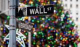 citi DowJones: Weihnachtsglocke Wall Street: Dow Jones schließt freundlich – Öl‑Aktien stark – Tesla enttäuscht schon wieder