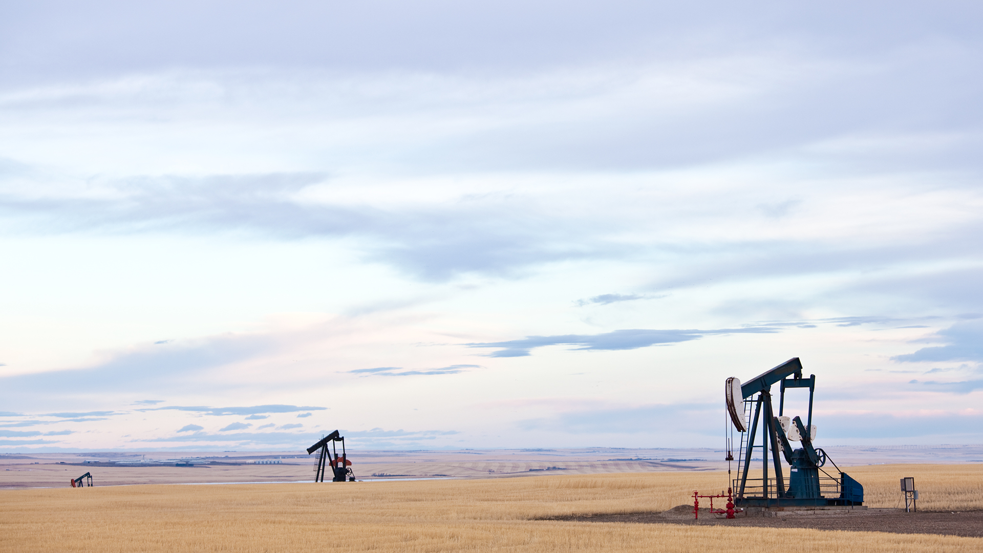 Diese Aktie besitzt Landrechte für Öl und Gas (Foto: ImagineGolf / iStock)