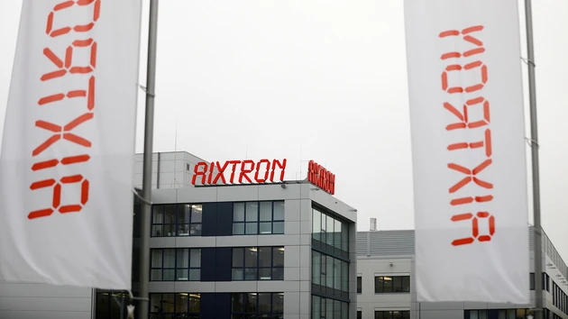 Aixtron‑Aktie schießt hoch und trotzt Gewinnwarnung: Die ersten Analystenstimmen