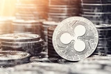 DAX: Ripple‑CEO schießt gegen Bitcoin